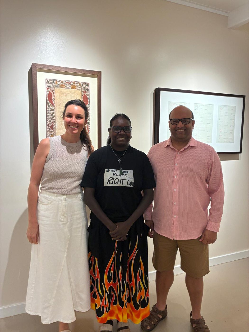 At the Buku-Larrnggay gallery in Yirrkala with Tiani and Rachael, one of the Bark Petitions on display behind us
